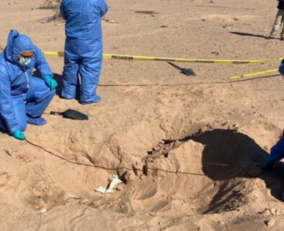 Çukurda 132 kişiye ait kemikler bulundu